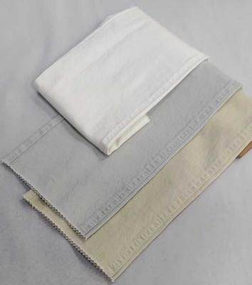kopen Elastic 328GSM 3/1 left twill with full width 57/58
